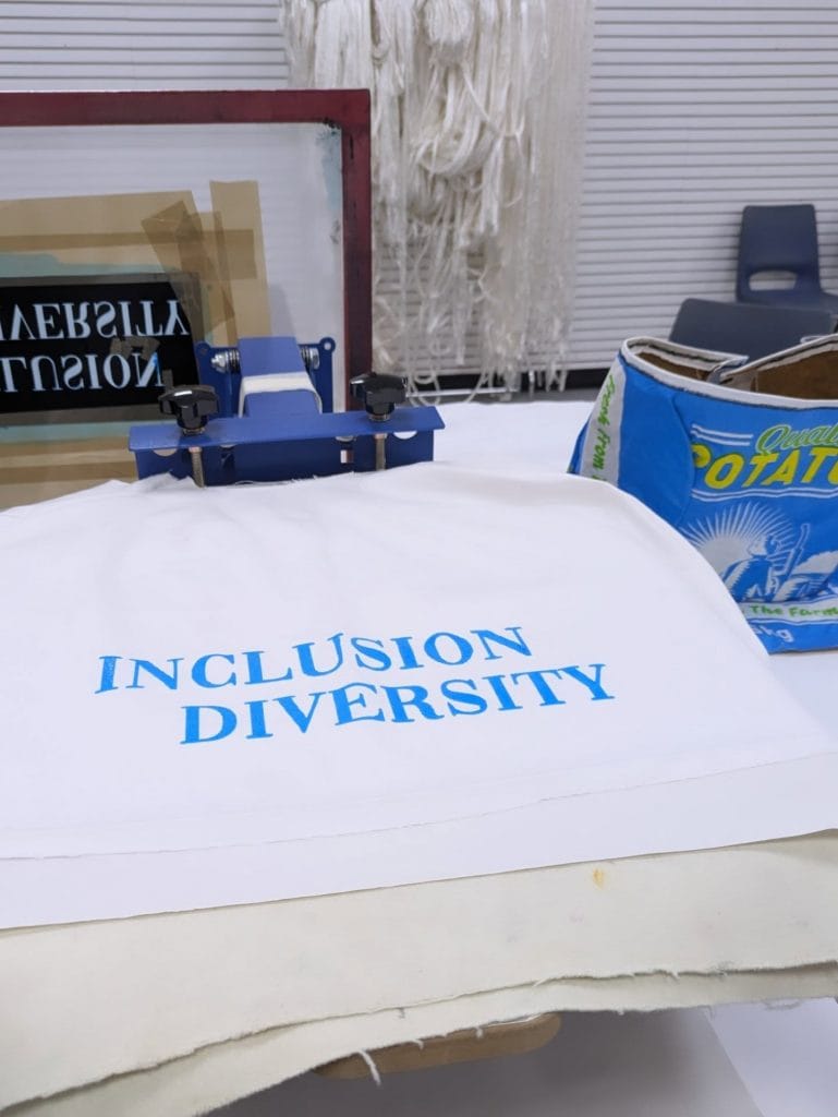 Inclusion and Diversity Cape with Mary's Potato Sack Dress